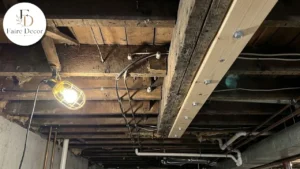 New board fastened alongside an old floor joist